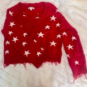 Cropped distressed star sweater